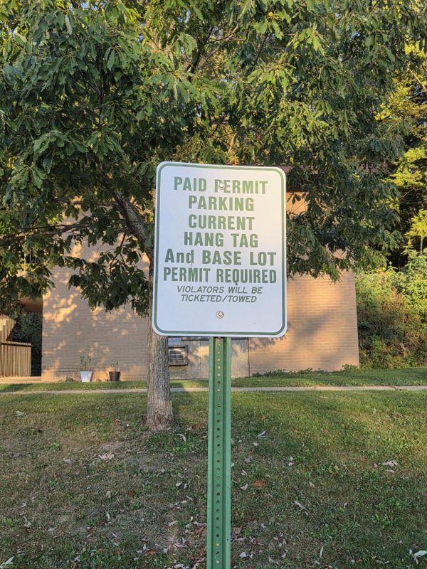 UA Paid Permit Parking Sign