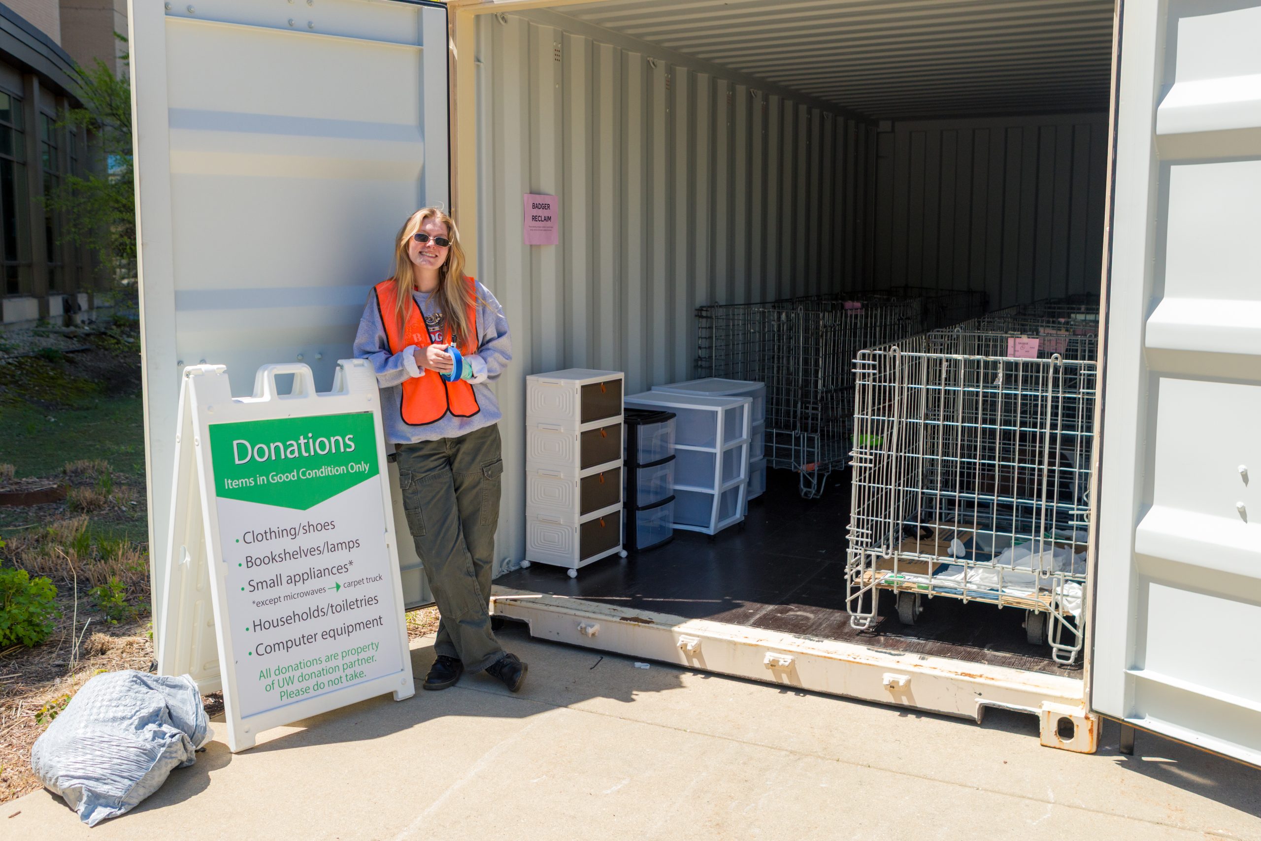 Staff member posing at Sustainability Move-Out Spring 2025 collection site