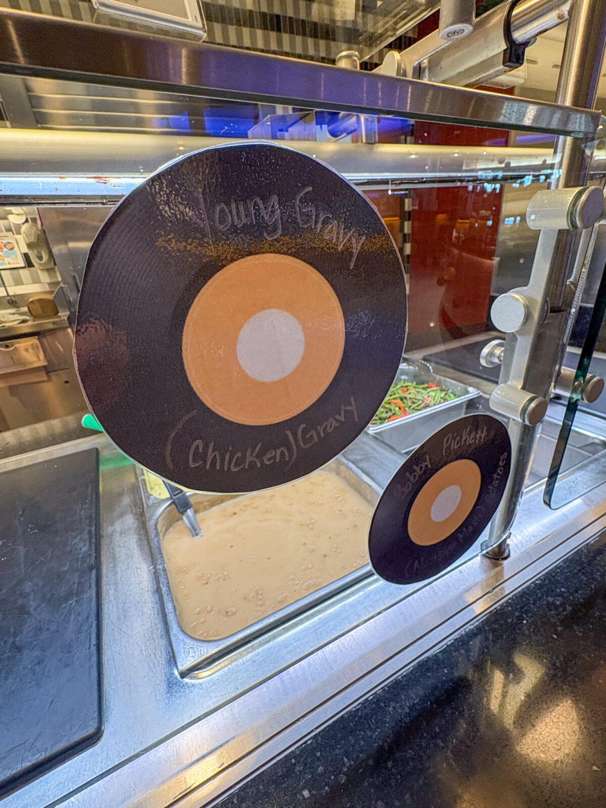 Young Gravy record sign with chicken gravy in the background
