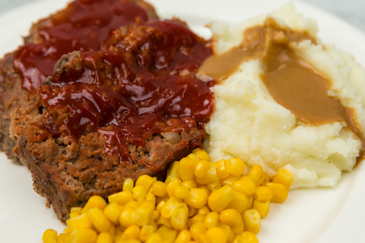 Meat loaf, mashed potatoes, and corn