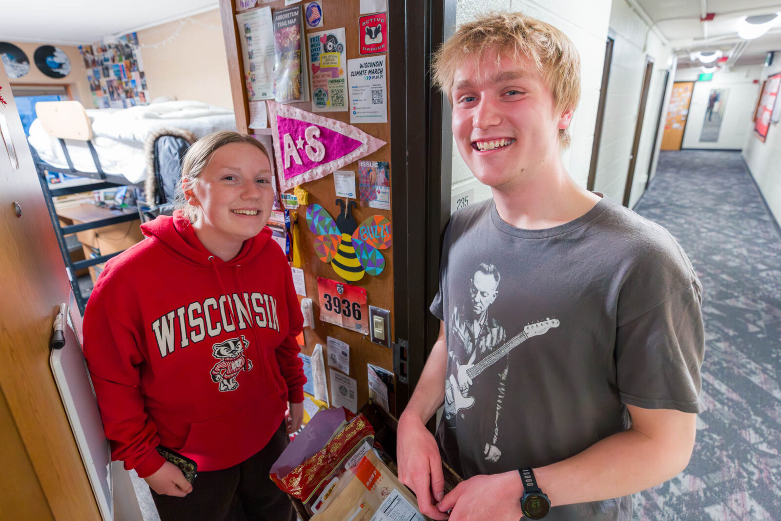 Michael talks with a resident in Bradley Residence Hall.