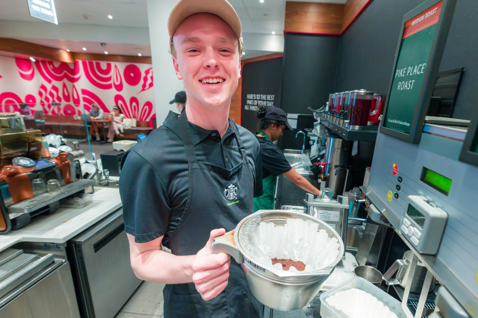 Tyler maintains equipment at Starbucks in Smith Residence Hall.