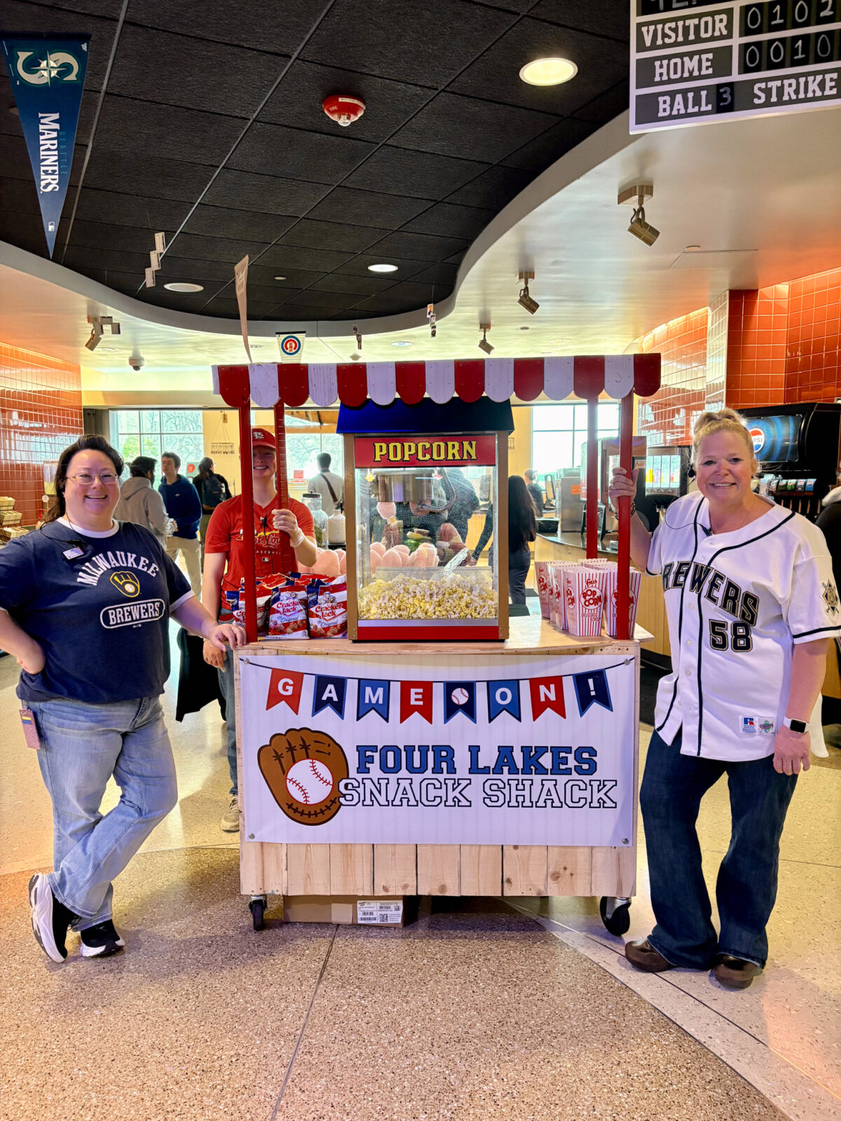 Staff pose for photo at Opening Day Snack Shack