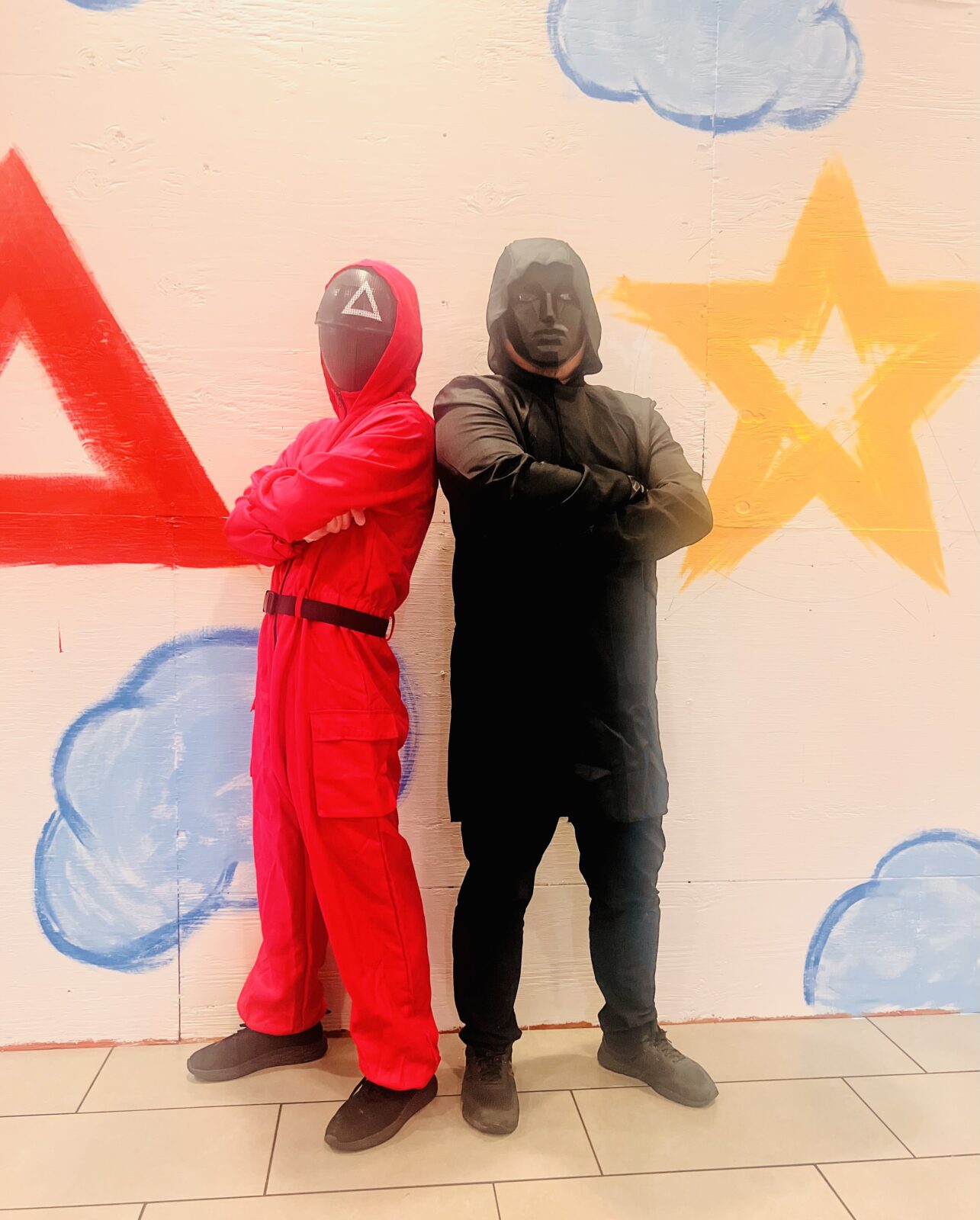 Staff members pose dressed up for Squid Game event at Gordon