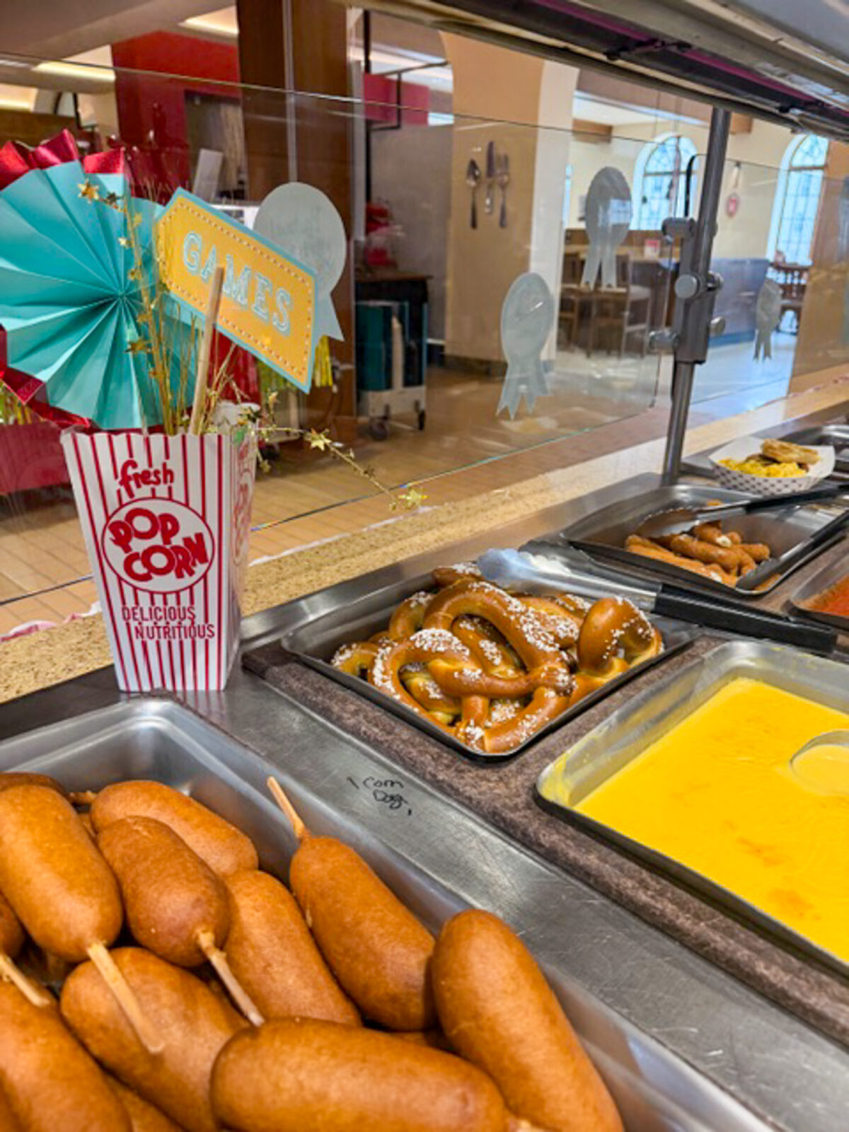 Corn dogs and soft pretzel station at the Fair Day event
