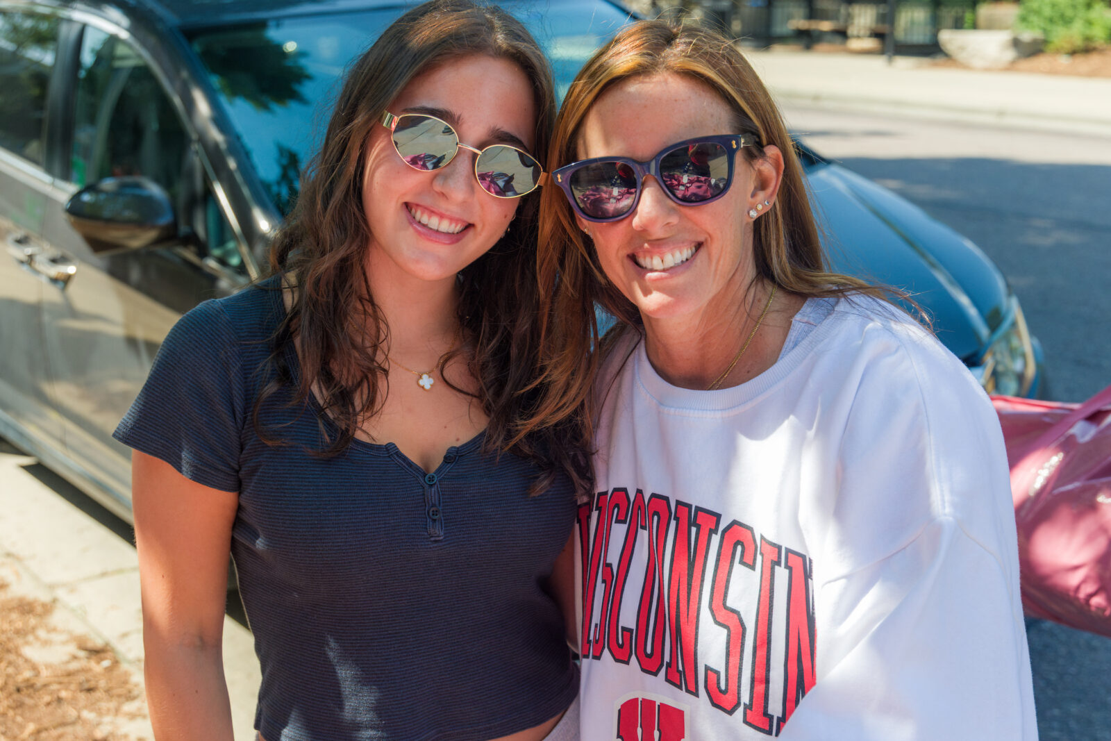 A student and her Mom pose
