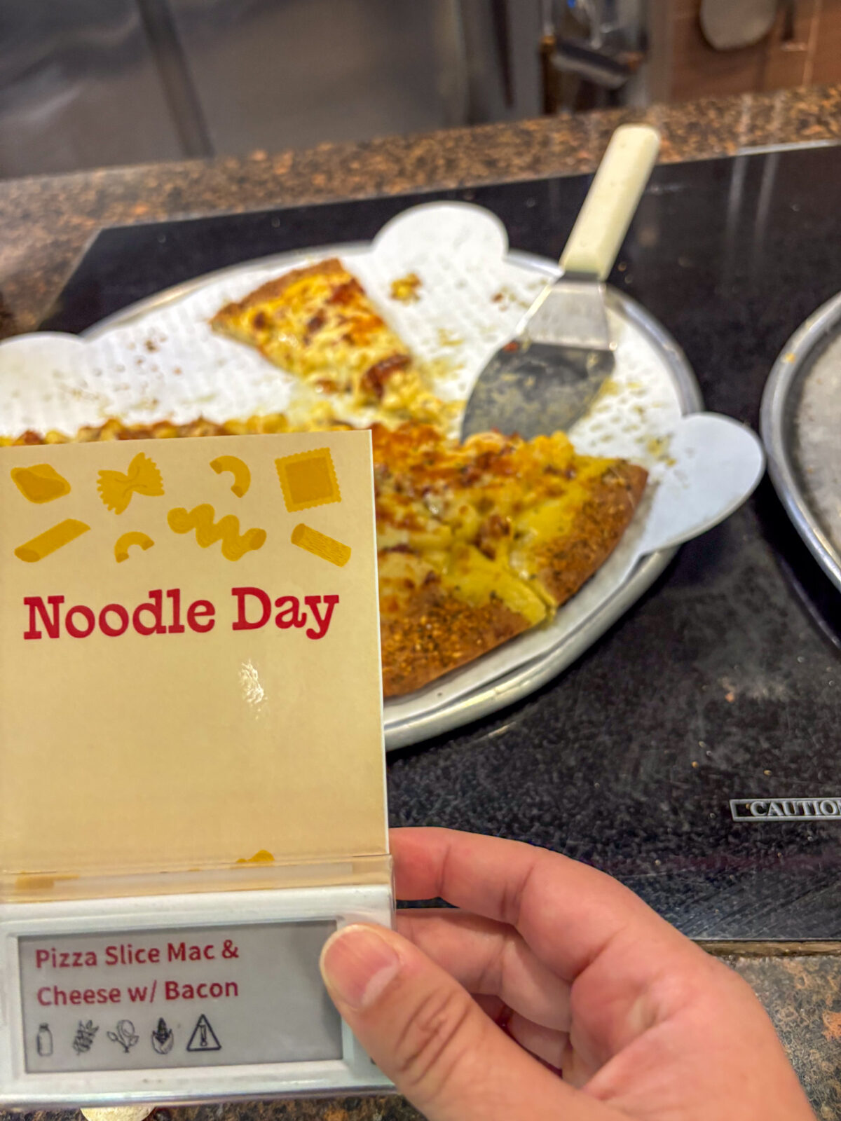 Pizza Slice Mac & Cheese with Bacon at Noodle Day